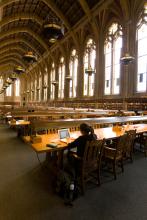 Student studying in Suzzallo reading room