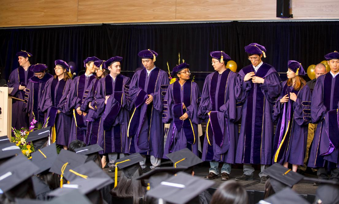 A group of people at graduation ceremony