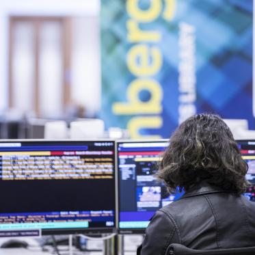 Student coding on computer